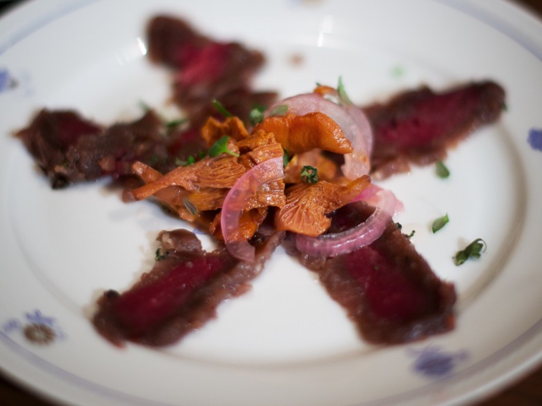 Cured fallow deer tenderloin with pickled chanterelles