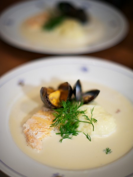 Arctic char with potato purée and clam sauce